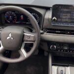 Rent Mitsubishi Outlander 2023 in Dubai Silver Interior Steering