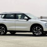Rent Mitsubishi Outlander 2023 in Dubai Silver Side view