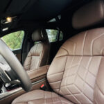 Rent BMW 735i in Dubai front seats