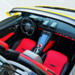 Rent Lamborghini Huracan Evo Spyder Convertible in Dubai red seats