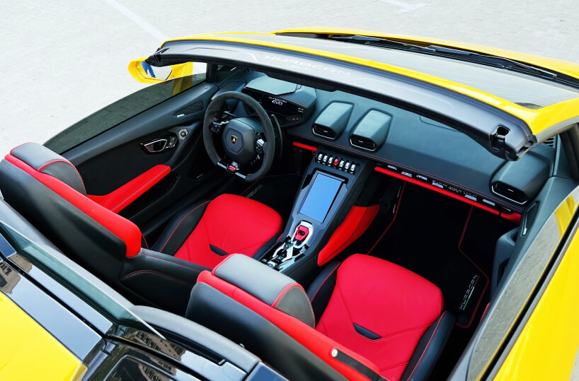Rent Lamborghini Huracan Evo Spyder Convertible in Dubai red seats