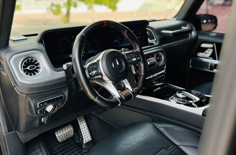 Rent Mercedes Benz AMG G800 Brabus in Dubai Interior from side