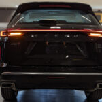 Rent Exeed VX in Dubai back view