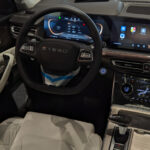 Rent Exeed VX in Dubai front steering interior