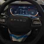 Rent Exeed VX in Dubai steering