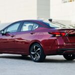 Rent Nissan Sunny in Dubai - left side
