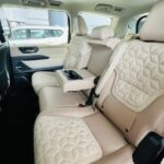 Rent Nissan Patrol 2026 in Dubai from Amex Car Rental Rear Left door interior view