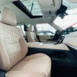 Rent Nissan Patrol 2026 in Dubai from Amex Car Rental Right door interior view