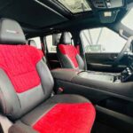 Rent Nissan patrol Nismo 2026 In Dubai from Amex Car Rental Interior Front Door view